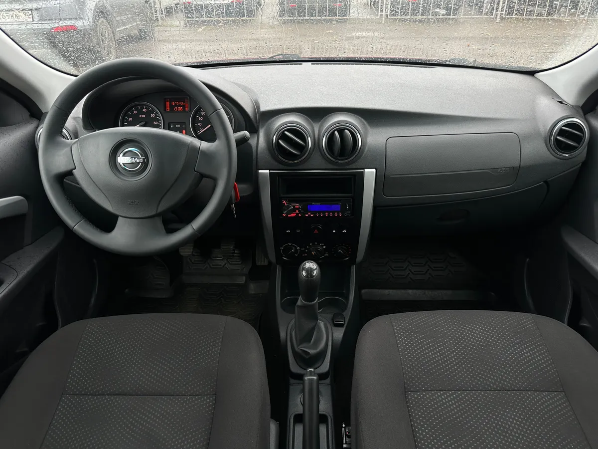 Nissan Almera 1.6 MT (102 л.с.)
