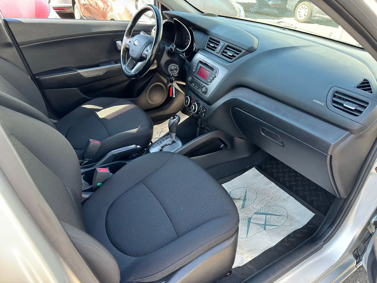 Kia Rio 1.6 AT (123 л.с.)