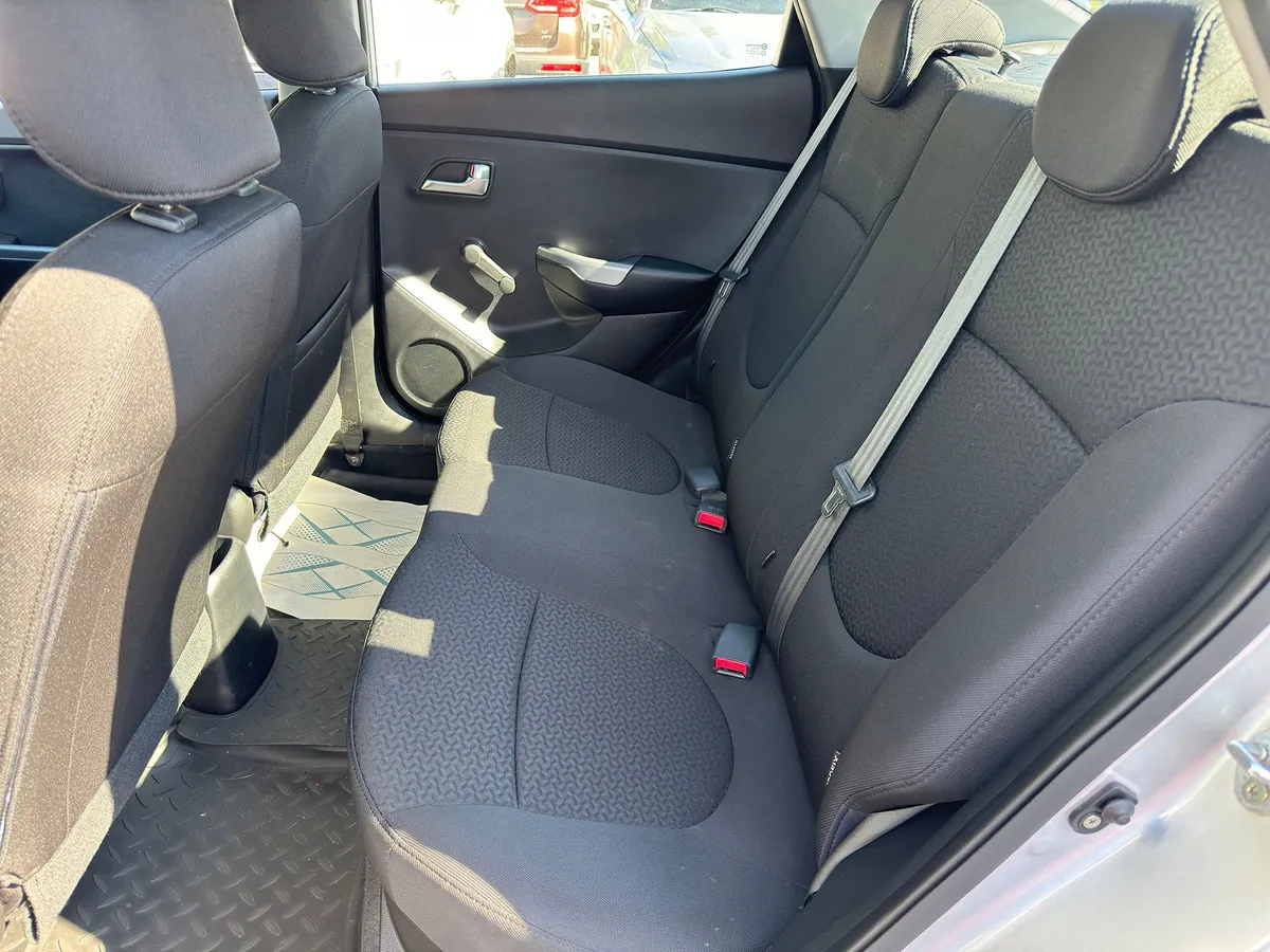Kia Rio 1.6 AT (123 л.с.)