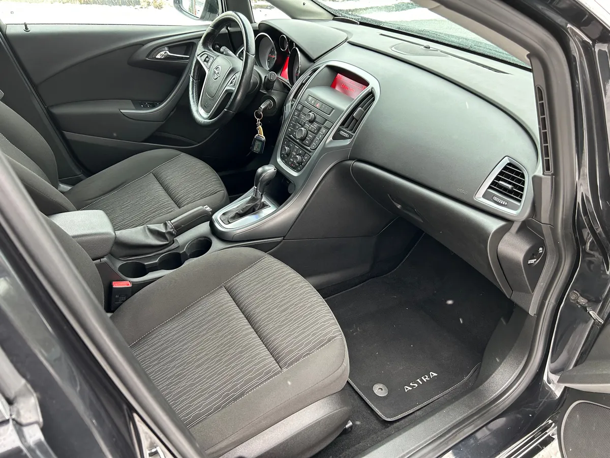 Opel Astra 1.6 AT (115 л.с.)