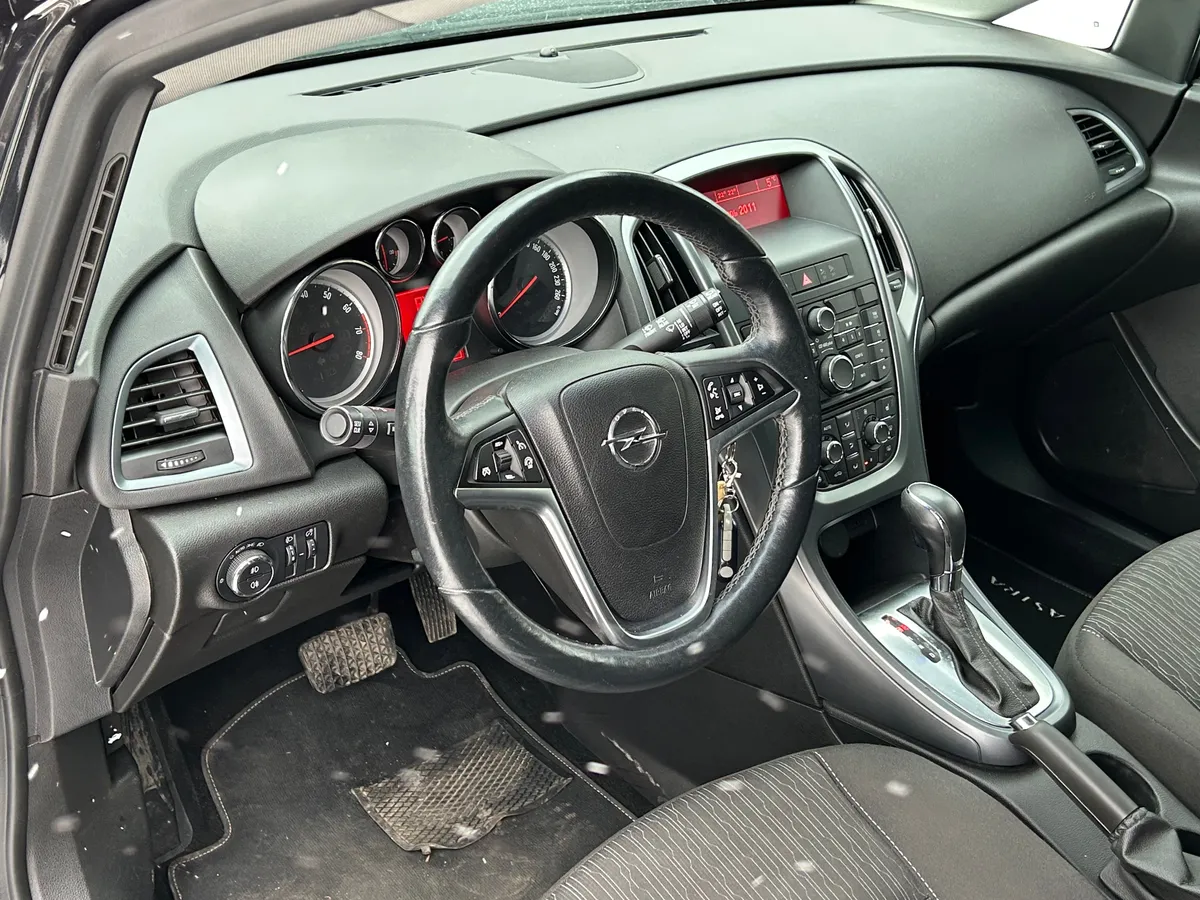 Opel Astra 1.6 AT (115 л.с.)