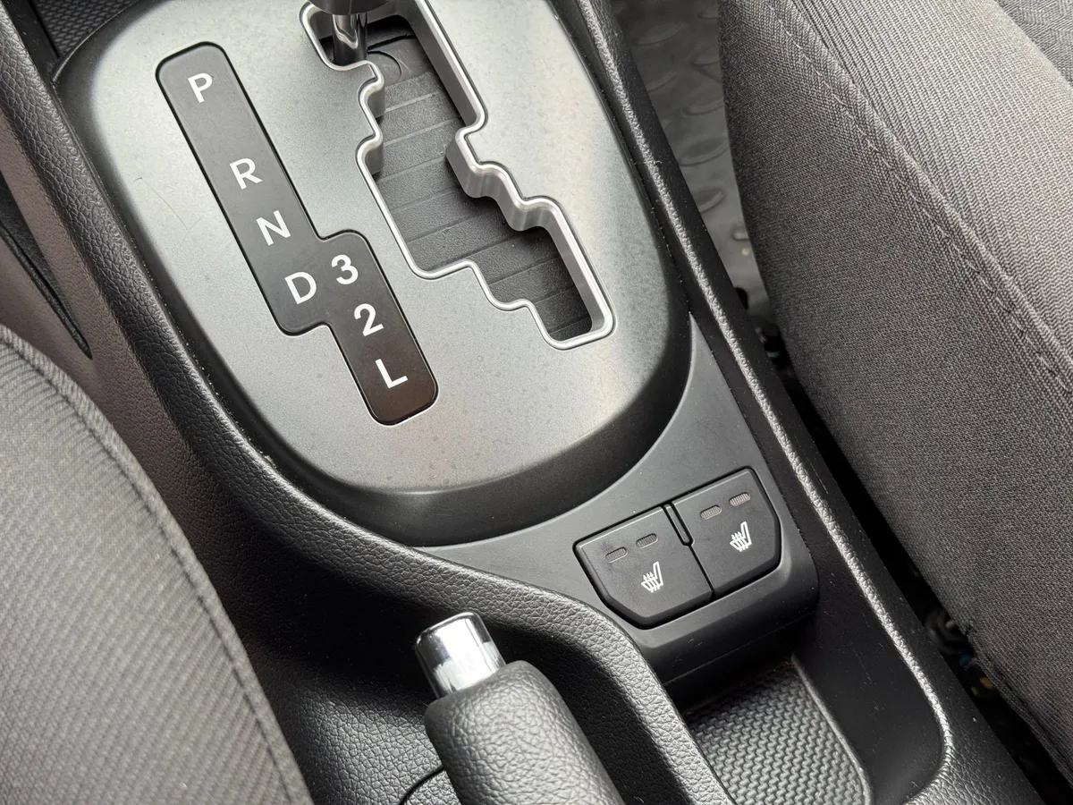Kia Rio 1.4 AT (107 л.с.)