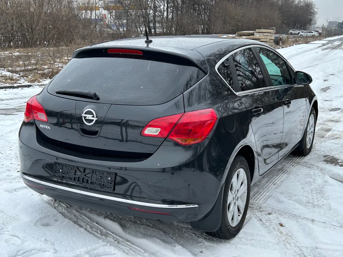 Opel Astra 1.6 AT (115 л.с.)